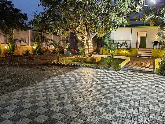 Courtyard around the old mango tree — PN Nature's Paradise Villa, Igatpuri