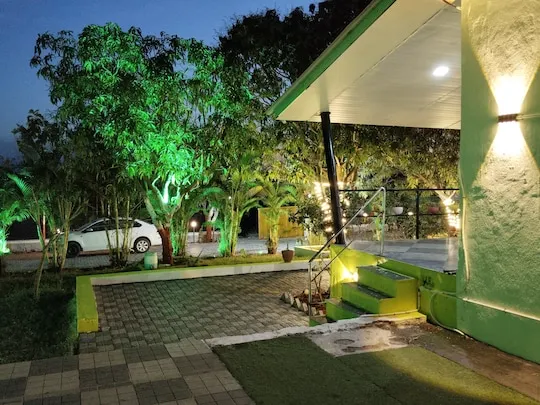 On-site parking and lit porch at PN Nature's Paradise Villa, Igatpuri